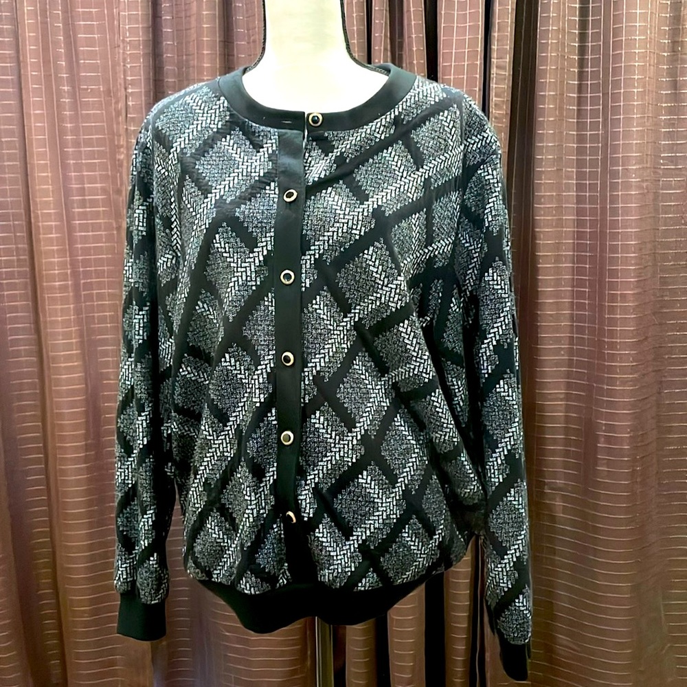 Black and grey sweater with decorative buttons